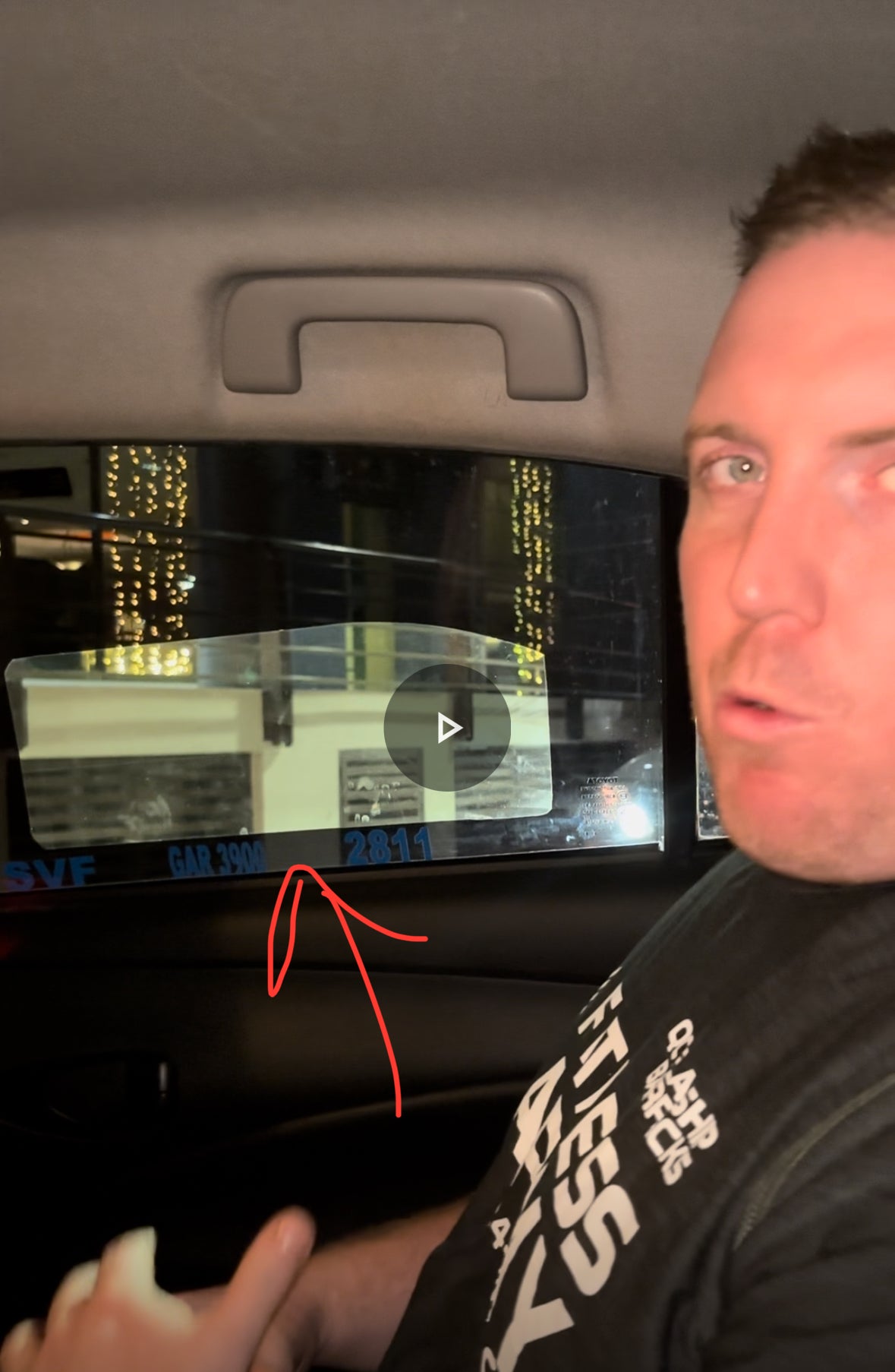Why do they cut holes in window tint in south east Asia?