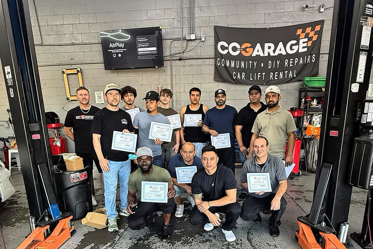 Tint Academy window tint course students holding certificates at CoGarage in El Monte, Los Angeles