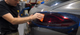Tinted head and tail light PPF film on car tail lights by Tint Academy Canada, showcasing protective and stylish light tinting.
